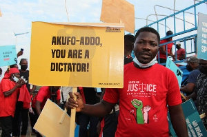 Protestor Hold Placards