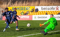 Deabeas Owusu-Sekyere hitting the ball past the goalkeeper