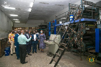 The Information Minister and officials of the state newspaper when he visited them this week