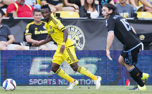 Ghana defender Harrison Afful in action