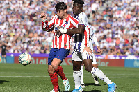 Ghana international Mohammed Salisu tackling Atletico Madrid striker Alvaro Morata