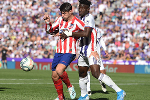 Ghana international Mohammed Salisu tackling Atletico Madrid striker Alvaro Morata