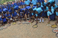 The students display their rackets