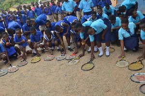 The students display their rackets