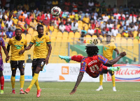 Sulley Muntari tries an acrobatic kick credit: 442