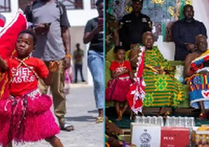 When the boy needed a restroom break, he asked Otumfuo to hold the flag