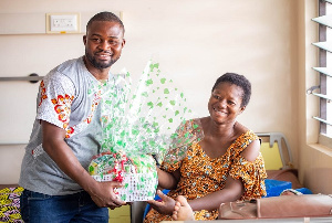 A mother receiving a hamper