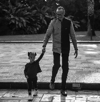 Kagame with his granddaughter Ava