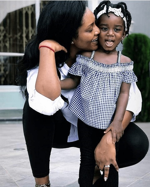 Tracy Sarkcess and their daughter Titi