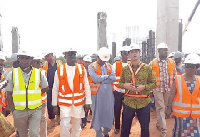 Mr Jorge Tavares de Almeida (4th L) taking Mr Kofi Adda (2nd L) and his entourage round the project