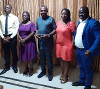 Group picture of Affail Monney, john Boadu with other dignitaries