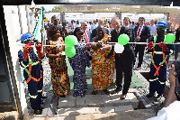 Netherlands ambassador in Ghana, Ron Strikker, opens the tank cleaning station.