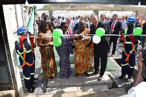 Netherlands ambassador in Ghana, Ron Strikker, opens the tank cleaning station.