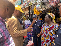 Mr Kofi-Nti interacting with some Spare Parts Dealers at Abossey Okai