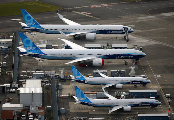 An aerial view of Boeing 777X and Boeing 737 MAX 10 airplanes