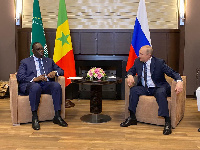 Macky Sall with Vladimir Putin (right) in Sochi