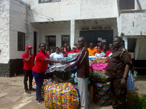 Hagar Darkey presents the items to DSP Darko