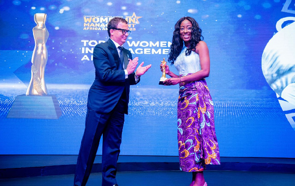 Sheila Wristberg receiving her award during the event in Dar Es Salaam