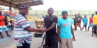 Kwabena Ofosu Bamfo being awarded