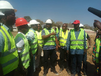 Isaac Asiamah interacts with the contractors on one of his inspections