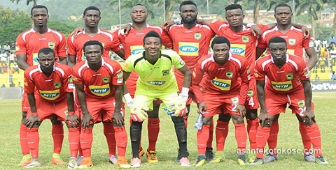 Asante Kotoko players pose for a photograph