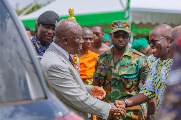 Otumfuo Osei Tutu II interacting with some dignitaries