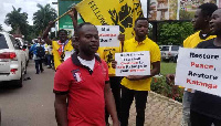 Some of the residents displaying the placards