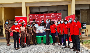 Absa Bank Employees Presenting The Items To Officials Of The Senior Correctional Centre