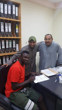 Awal Mohammed signing his contract