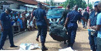 File photo: Police convey bodies to morgue