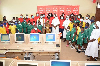 A group picture of Absa employees, school authorities and students