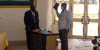 Erastus Asare Donkor taking his oath before the committee