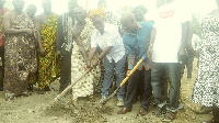 Chief of Akim Osiem and MP for Abuakwa North breaking the ground for work to commerce