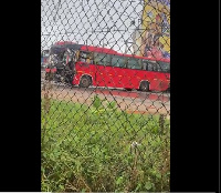 The bus sits in the middle of the road towards Tema from Accra