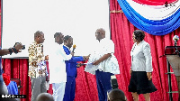 Joe Ghartey (second right) receiving his forms