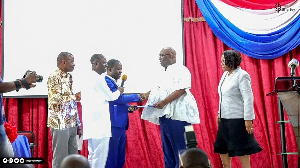 Joe Ghartey (second right) receiving his forms