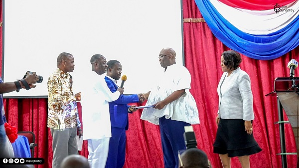 Joe Ghartey (second right) receiving his forms