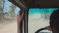 Clouds of dust are a constant threat to travellers on the Bolgatanga-Bawku-Pulmakom road