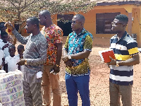 Hon Daniel Kwaku Mensah at an orphanage home with some association members