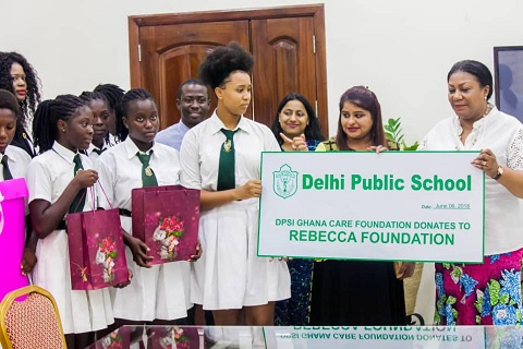 Mrs. Rebecca Akufo-Addo with some pupils and teachers of Delhi Public School International