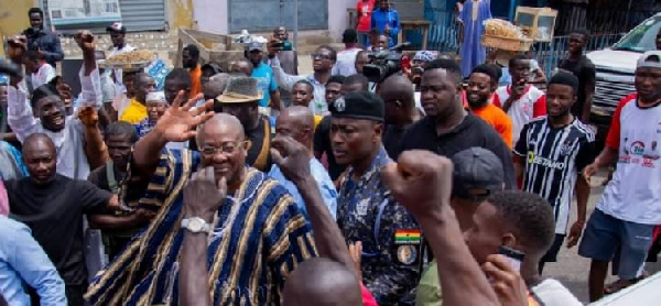 John Mahama being ushered into the Chief Imam's residence