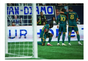 Joseph Paintsil celebrates with teammates after scoring a stunning goal