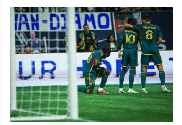 Joseph Paintsil celebrates with teammates after scoring a stunning goal