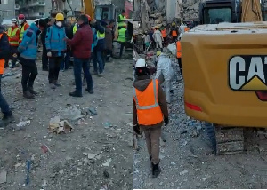 Rescue workers at the site of the Hayat Renaissance building