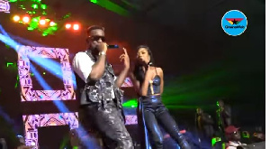 Sarkodie and Efya on stage performing Saara