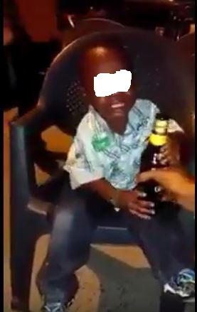 Kid drinking alcohol