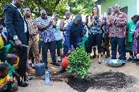 Benito Owusu-Bio planting a tree