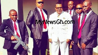 File photo: A pastor flanked by his bodyguards