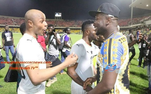 Dede and Asamoah Gyan interacting after the game