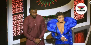 John Dumelo, Zynnell Zuh on stage at the Vodafone Ghana Music Awards